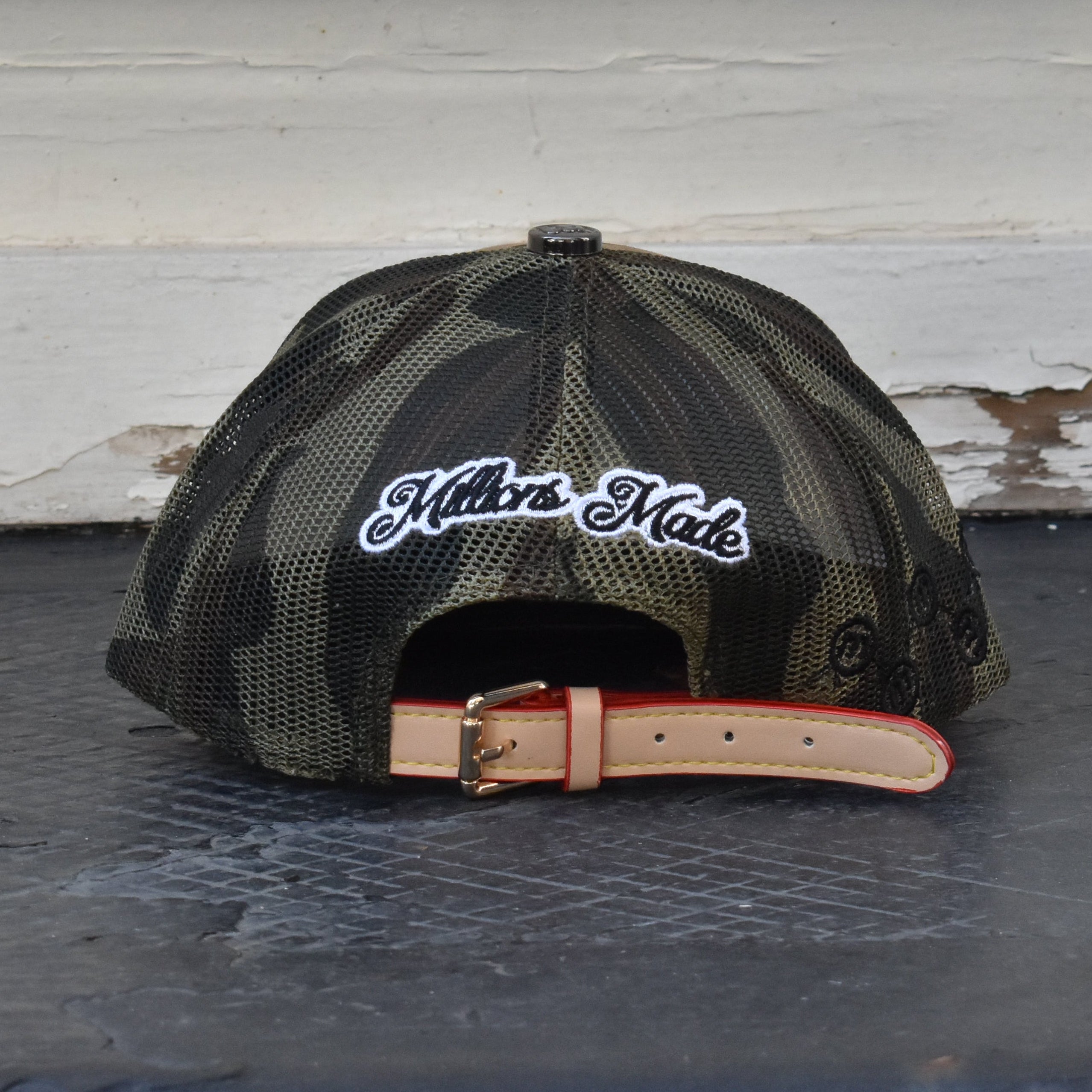 MILLIONS CAMO TRUCKER HAT